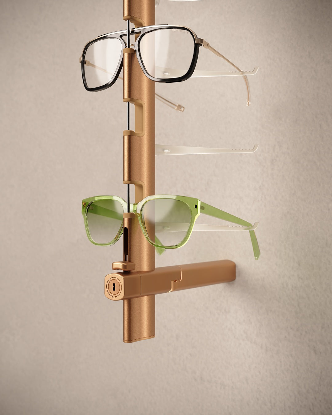 Copper coloured Eyewear rod with three pairs of glasses on a beige background