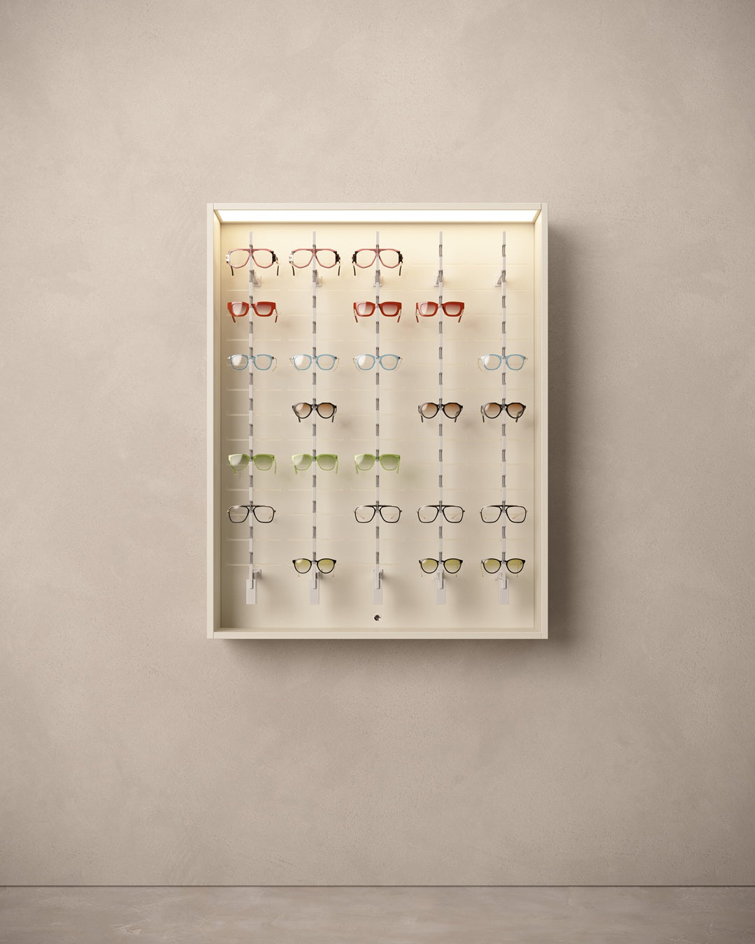 Display of eyeglasses on a wall-mounted Optical store wall unit white against a beige background