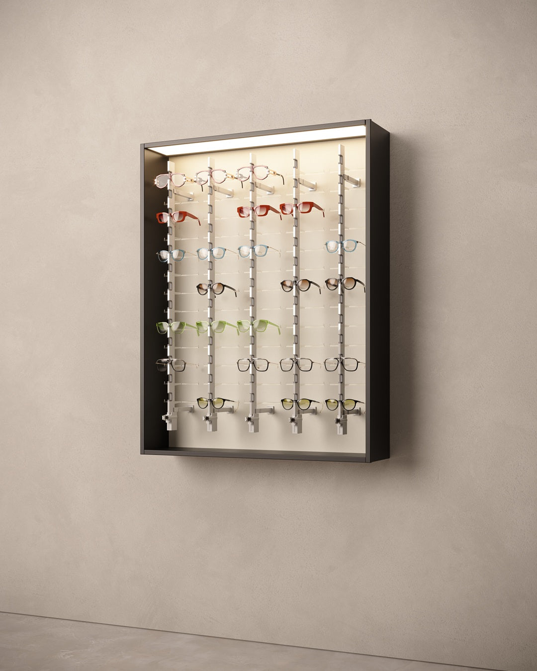 Optometry cabinet for glasses with various eyeglasses on a beige wall.