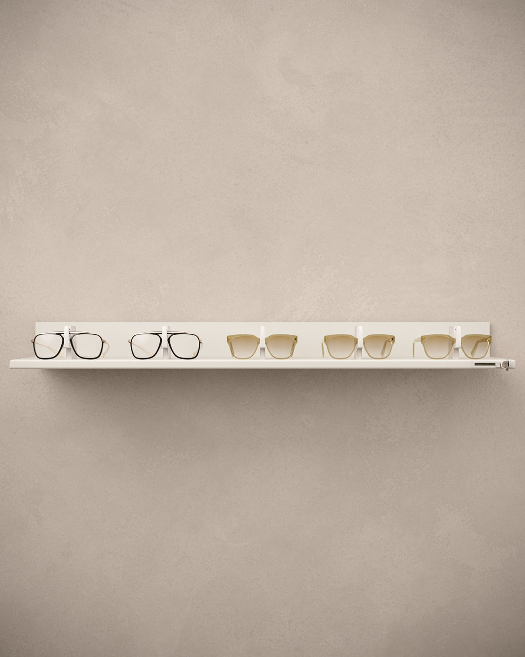 White Optometry display shelves with eyeglasses against a beige wall