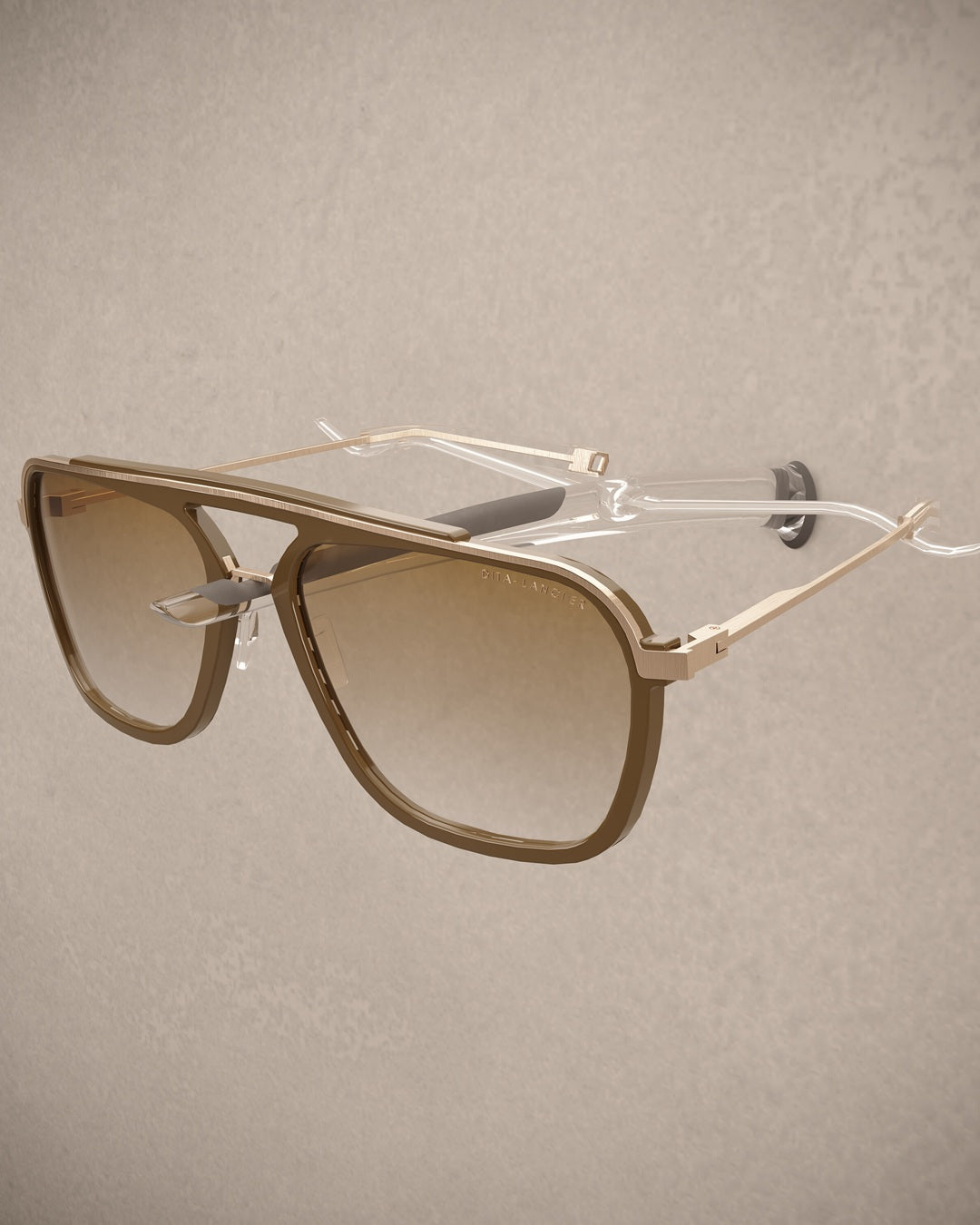 Sunglasses with gold frame and gradient lenses on a Spectacle holder stand