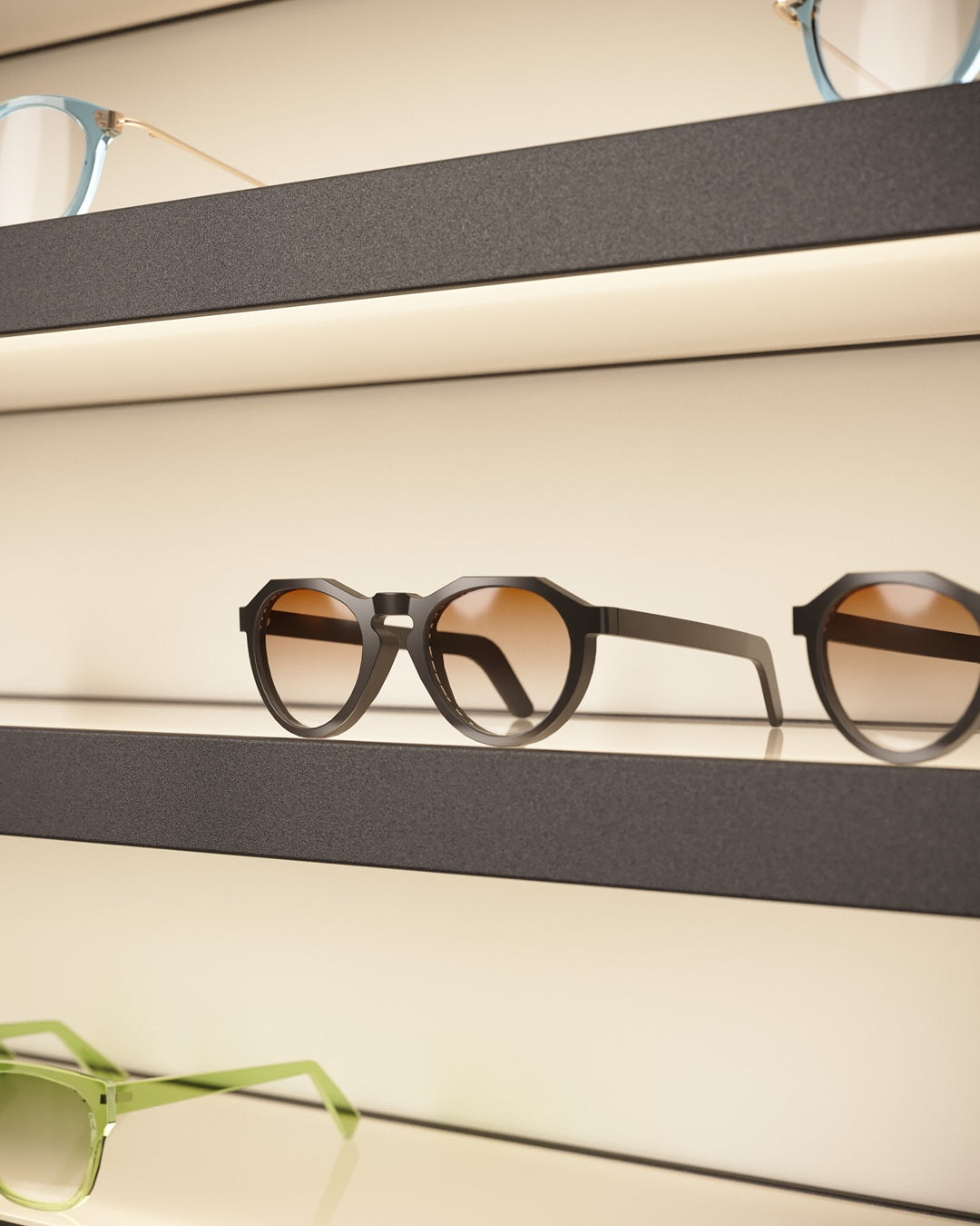 Sunglasses with brown lenses on a Sunglass shelf display panel