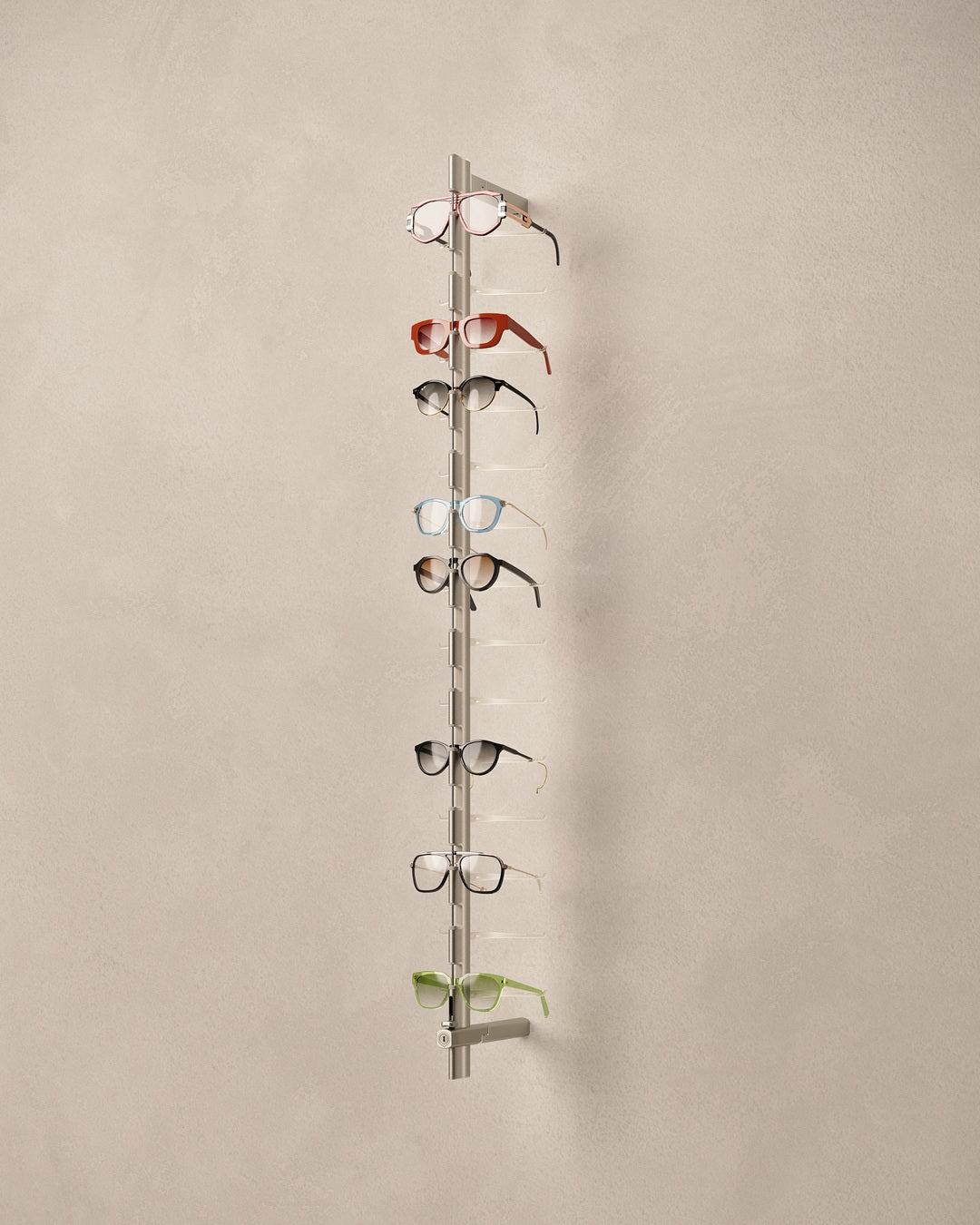 Sunglasses wall display with multiple pairs of eyeglasses on a beige background