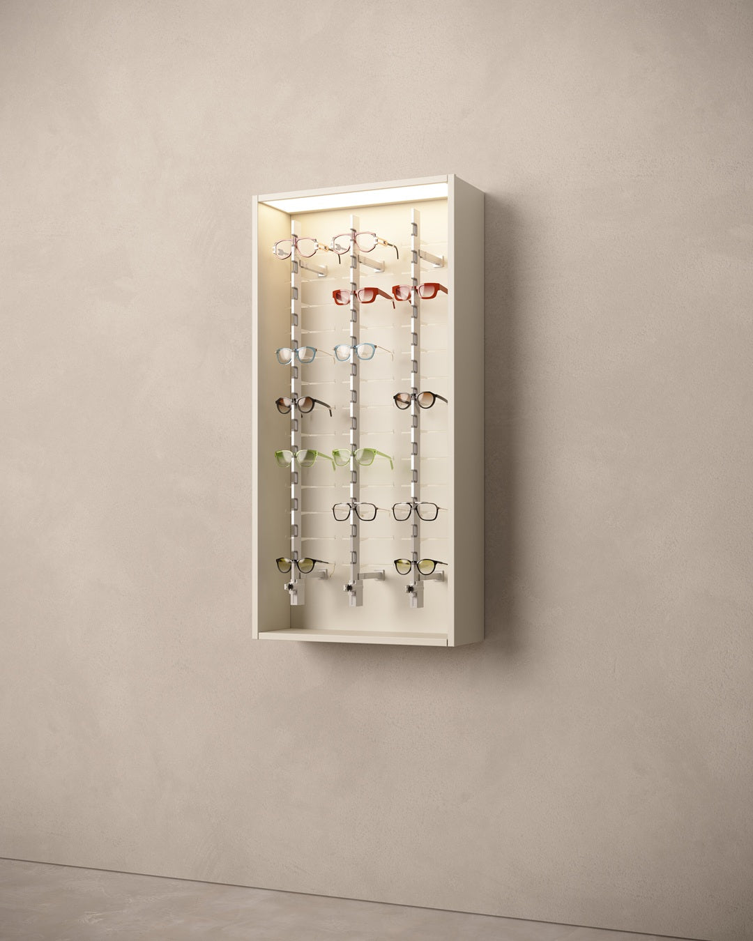 Wall-mounted cabinet for glasses secured with various eyeglasses on a beige wall.