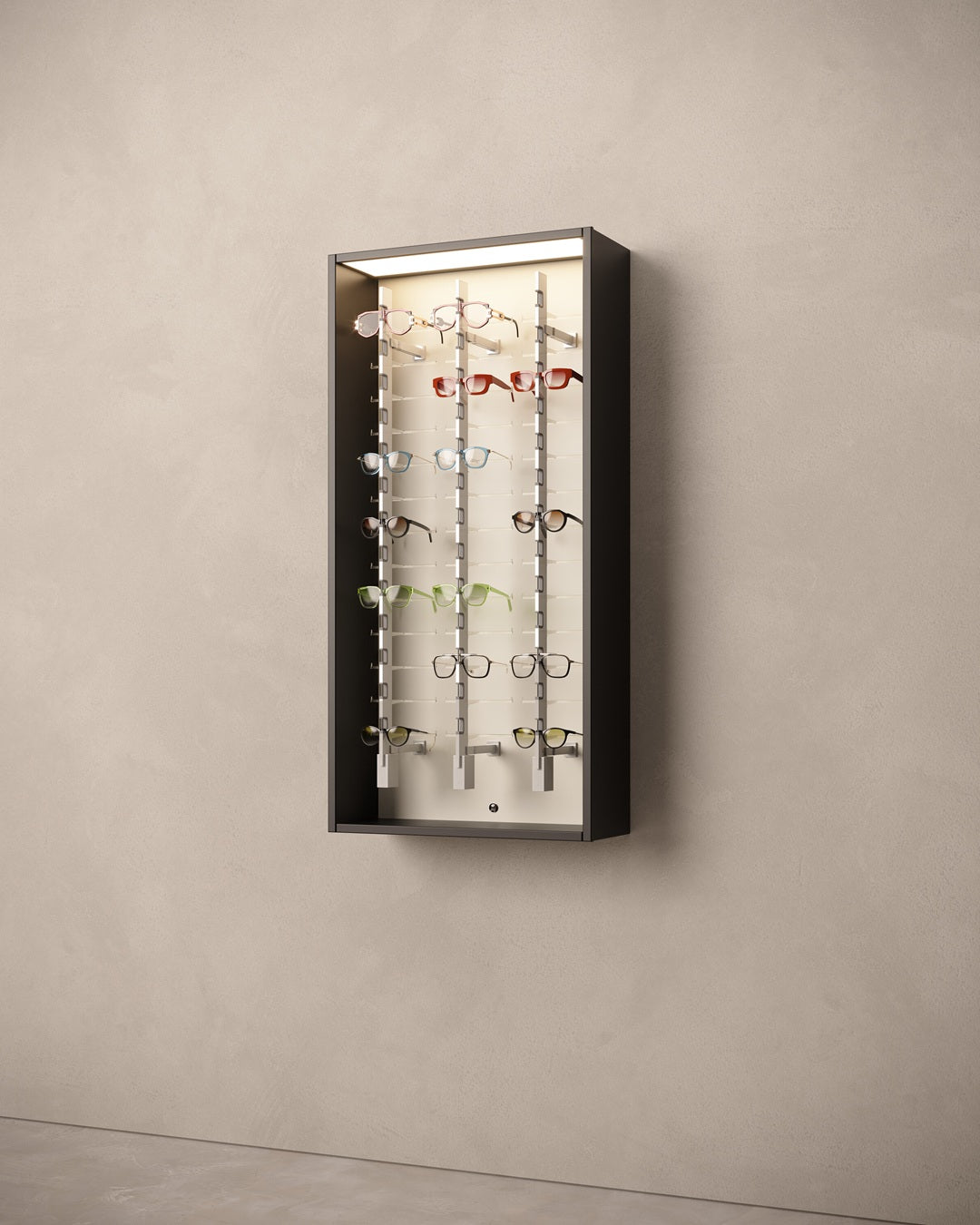 Wall-mounted cabinet for sunglasses with multiple pairs of glasses on a beige wall.