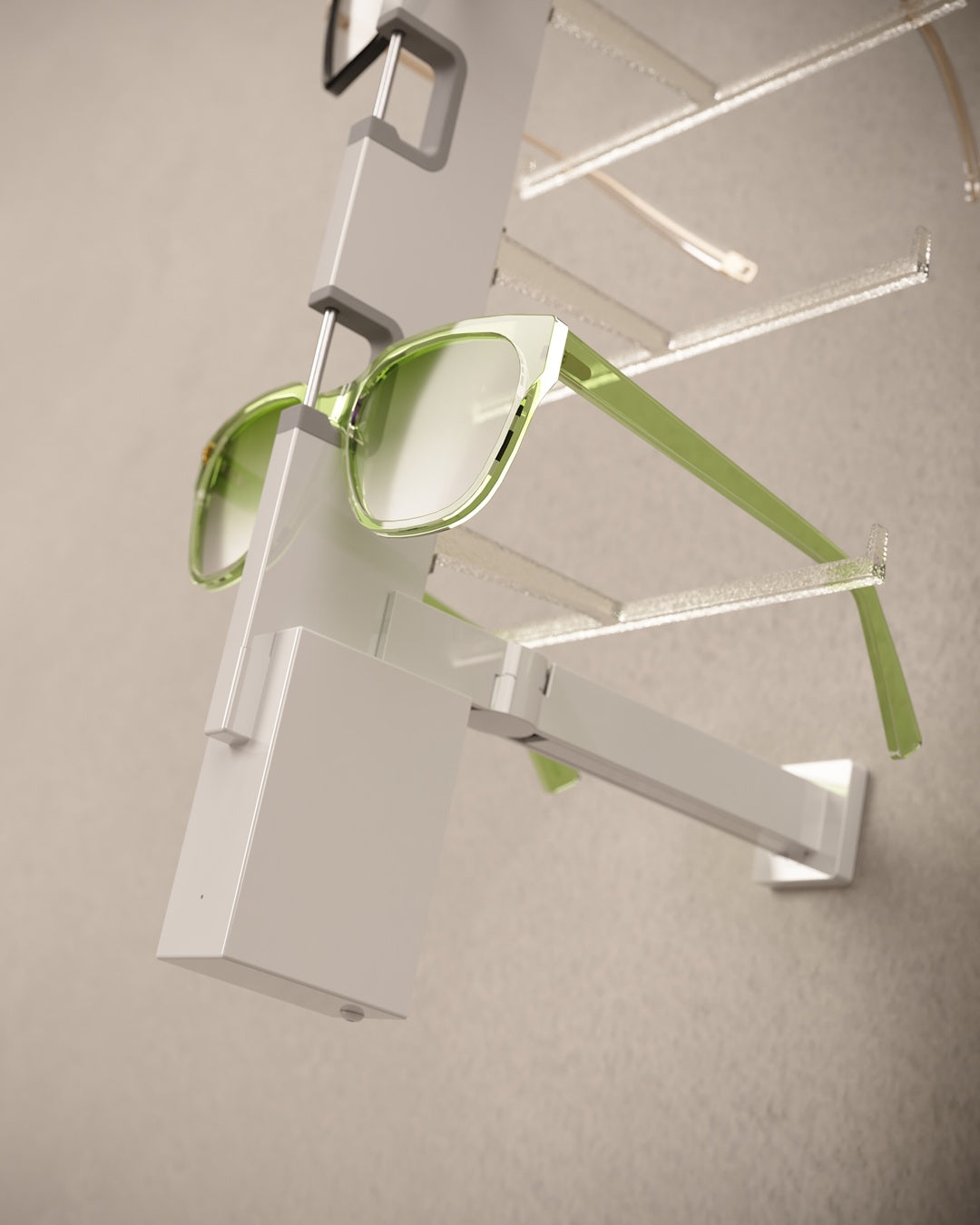 Green sunglasses on a white Glasses display rack against a neutral background
