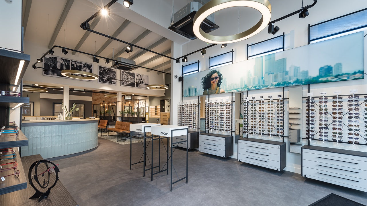 Optometry optical store design with lockable eyewear rods and seating area