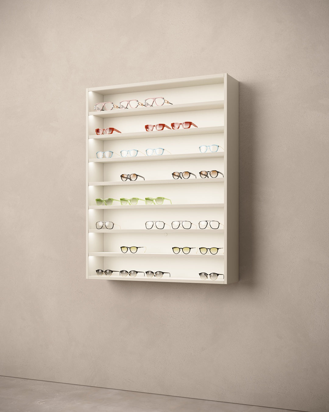 Wall-mounted illuminated cabinet for sunglasses on a beige wall