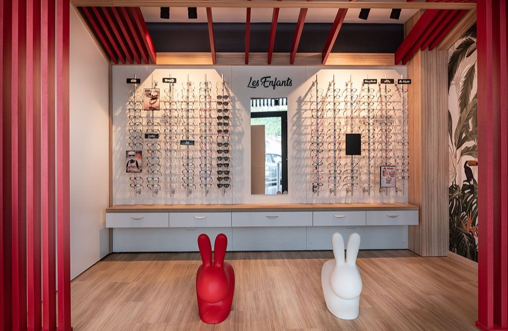 Top Vision Instore optical shop design wall-mounted eyewear display